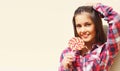 Summer portrait of beautiful happy smiling young brunette woman with lollipop Royalty Free Stock Photo