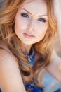 Summer portrait of beautiful red-haired woman. Royalty Free Stock Photo