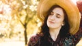 Summer portrait, beautiful young woman wearing straw hat at sunset time Royalty Free Stock Photo