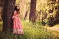 Summer portrait of happy child girl dressed in pink fairytale princess dress Royalty Free Stock Photo