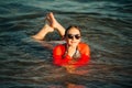 Young teenage girl having fun in the sea Royalty Free Stock Photo