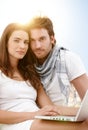 Summer portrait with young couple with laptop Royalty Free Stock Photo