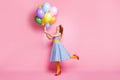 Summer positive travel weekend. Full length profile side photo positive lady hold baloons enjoy party wear blue skirt