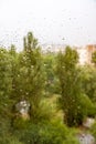 Summer rain in the city blurry background Royalty Free Stock Photo