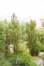 Summer rain in the city blurry background Royalty Free Stock Photo