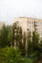 Summer rain in the city blurry background Royalty Free Stock Photo