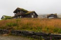 Summer rain Norwegian traditional village houses Royalty Free Stock Photo