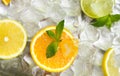 Summer refreshing background of Orange, lemon, lime and mint Royalty Free Stock Photo