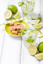 Summer refreshing cocktail caipirinha with lime and mint on white wooden vintage background. Royalty Free Stock Photo