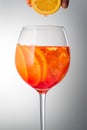 Summer refreshing faintly alcoholic cocktail Aperol spritz in a