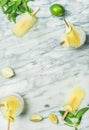 Summer refreshing lemonade popsicles with lime and mint leaves Royalty Free Stock Photo