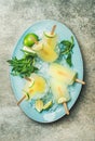 Summer refreshing lemonade popsicles with lime and mint on plate Royalty Free Stock Photo