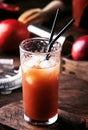 Summer refreshing low alcohol cocktail with vodka, orange juice, bloody orange and ice. Hot day at the beach bar. Selective focus Royalty Free Stock Photo