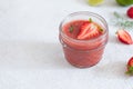 Summer refreshing strawberry smoothie, gazpacho on light background