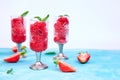 Summer refreshing strawberry sorbet, slush granita drink in serving glasses