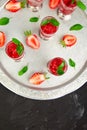 Summer refreshing strawberry sorbet, slush granita drink in serving glasses