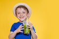 Summer refreshment. Cold beverage. Little boy with plastic cup of fresh lemonade Royalty Free Stock Photo