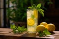 Summer Refreshment: Dewy Glass of Lemonade with Fresh Lemon Slice Royalty Free Stock Photo