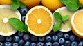 Summer Refreshment Lemonade with Fresh Lemon, Orange, Blueberries, and Mint Leaves on a Vibrant Background. created with Royalty Free Stock Photo