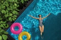 Summer Relax. Woman Floating, Swimming Pool Water. Summertime Holiday