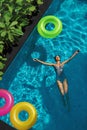 Summer Relax. Woman Floating, Swimming Pool Water. Summertime Holidays Royalty Free Stock Photo