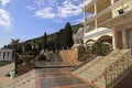 Summer resort villa with steps in scenary garden