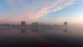 Summer river in morning dawn. Nature landscape on riverside with reflections of sky in water Royalty Free Stock Photo