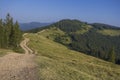 The road on the mountain ridge on a sunny day Royalty Free Stock Photo