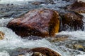 in summer rocky mountain river water silk. mountain river