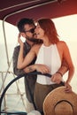 Summer romance on vacation - couple on the luxury boat enjoy