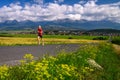 Summer running training. Long distance runner train in summer landscape