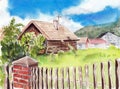 Summer rural landscape. Wooden house and  fence with green garden in the yard Royalty Free Stock Photo