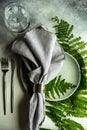 Summer rural table setting with fern