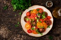 Summer salad of tomatoes of different colors Royalty Free Stock Photo