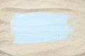 Summer sale template with beach sand and blue wooden background
