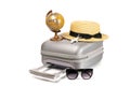 Summer sale. Travel accessories with suitcase, straw hat, toy airplane and globe in minimal trip vacation concept Royalty Free Stock Photo