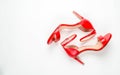 Red sandals on white background top view, flat lay, fashion, minimalism concept. Top view Royalty Free Stock Photo