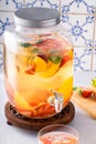 Summer sangria punch in a pitcher and glasses Royalty Free Stock Photo