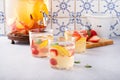 Summer sangria punch in a pitcher and glasses Royalty Free Stock Photo