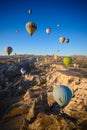 Summer scene of air balloon at sunrise over mountains, Goreme, Cappadocia. Famous landmark attraction in Turkey at sunrise