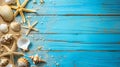 Summer scene with sand, shells and a starfish on an old blue wooden floor with copyspace Royalty Free Stock Photo