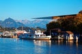 Summer scenery of beautiful Lake Lucerne under blue clear sky, with view of a tourist boat parking by the Culture & Congress Royalty Free Stock Photo