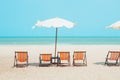 Summer sea beach empty chair umbrella with blue ocean sky for travel nature background