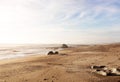 Summer sea beach in morning, sunrise on costaline, copy space. Sand and ocean, blue sky, outdoor, peace and quiet Royalty Free Stock Photo