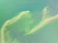 Summer sea nature background,Aerial view of texture sand water background,Sea surface ocean waves background,Top view beach Royalty Free Stock Photo