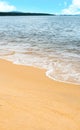 Summer sea sand beach with blue sky and cloud,Tropical beach sandy and blue sea waves with white clouds in sunny day, Vertical Royalty Free Stock Photo