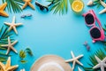 Summer sea vacation and travel background with rose-colored glasses, starfish, cocktail, straw hat and tropical leaves Royalty Free Stock Photo