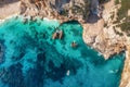 summer seascape from air. Turquoise sea water, rocks, boat and small sandy beach Island of sardinia in Italy. Travel Royalty Free Stock Photo