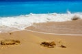 Summer seascape beautiful waves, blue sea water in sunny day. View of beautiful bright sea with waves splashing and beach sand. Royalty Free Stock Photo