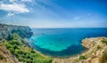 Summer seascape with Fiolent rocks formation on the coast of Sevastopol. view on cape in the sea, clear azure water, calm hot day